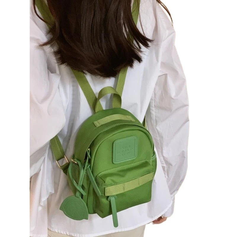 

Japanese niche mini compact shoulder bag pure color bright color macaron color green small backpack out shopping new schoolbag