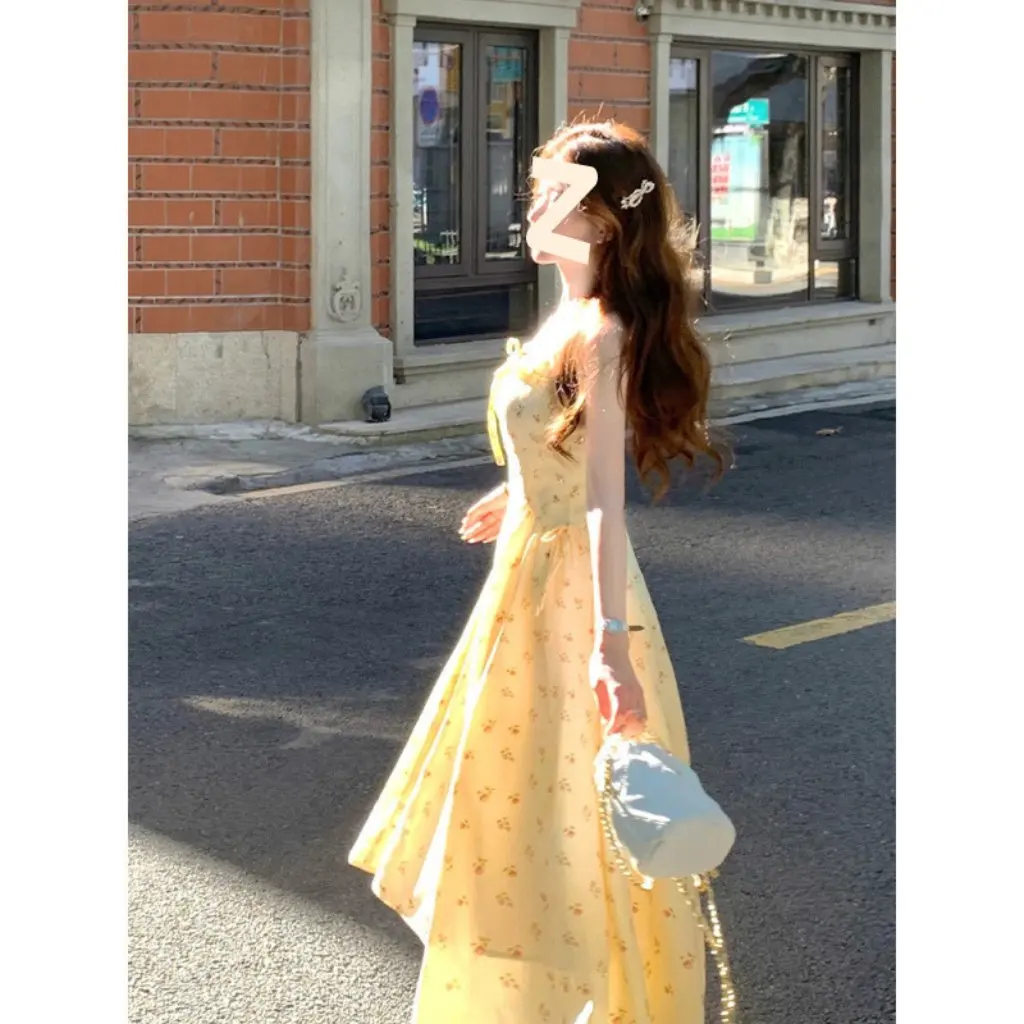 

Sydney Sweet Elegant Two-Piece Set Floral Long Skirt with Slim Suspender And Gentle Cardigan for Women