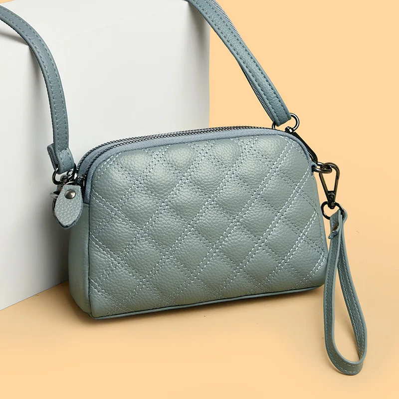 Fashion rhomb leather cross-body women all with soft leather hand zipper change storage shoulder bag