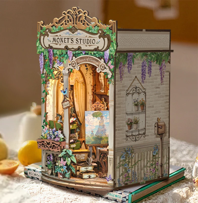 ชุดประกอบชั้นวางหนังสือไม้ DIY รูปแบบสตูดิโอของโมเนต์ พร้อมไฟและที่กั้นหนังสือรูปดอกไม้ เหมาะสำหรับเป็นของขวัญวันเกิดให้เพื่อน