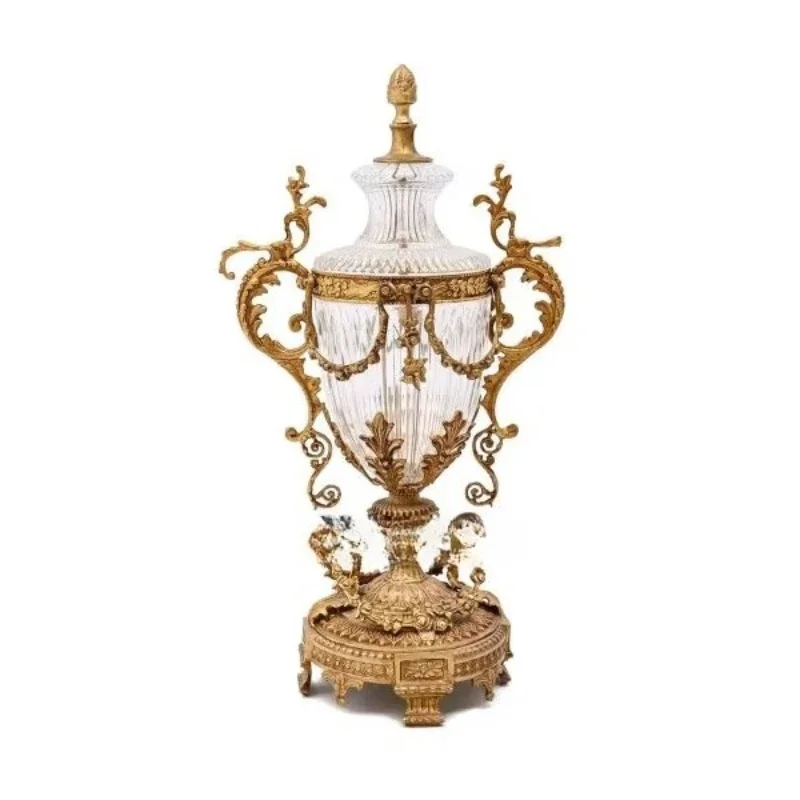 

Antique brass and glass vase with ornate gold handle decorative lid and exquisite classic base