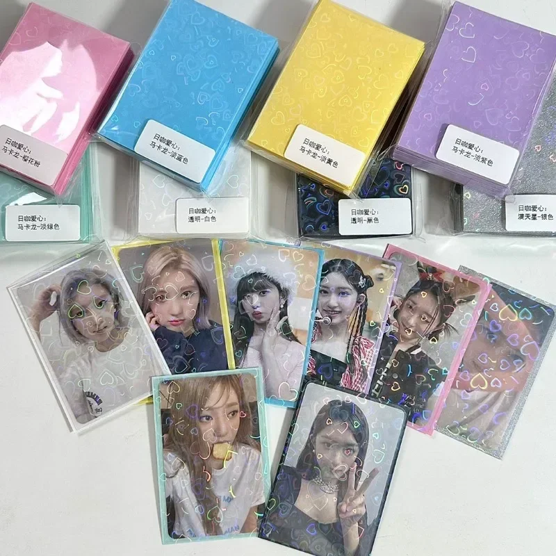 

50pcs/lot 61*91mm Heart Love Laser Flashing Card Sleeves Protector For Photo Cards Holder Holographic Foil Protective Films