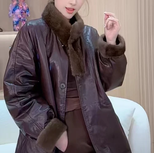 Skórzany płaszcz damski o luźnym kroju, średniej długości, puchowy, z kołnierzem, jesienno-zimowy, nowy, modny, wyszczuplający płaszcz.