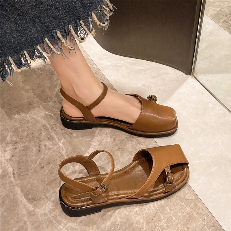 Flat casual braided Roman sandals women's new summer one-line buckle braided head sandals C1437