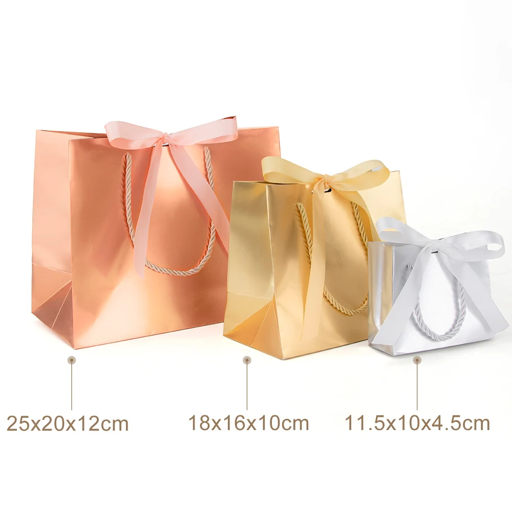 Laser gift paper bag holiday party gold and silver packaging carton ribbon small paper bag