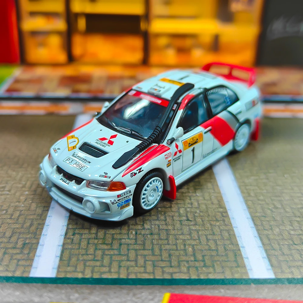 

1/64 Pop Race Mitsubishi Evolution IV # 1 Safari Kenya 1998 640231 (без коробки)