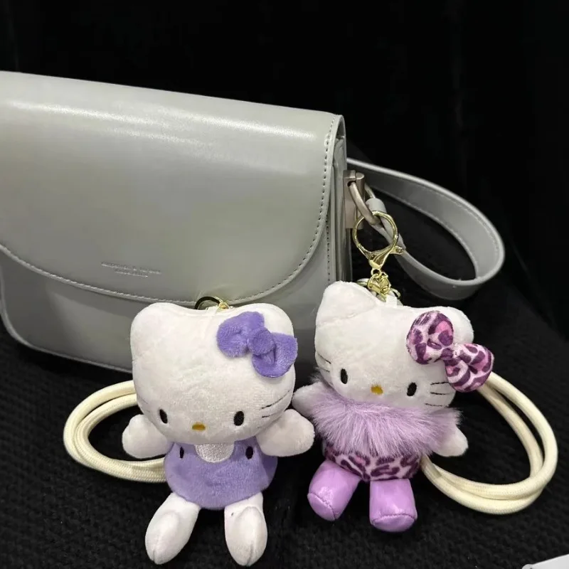 Kawaii Hello Kitty Plush จี้กระเป๋าพวงกุญแจอุปกรณ์เสริมสีม่วง Kt Plushie Key Chain ตุ๊กตาน่ารัก Key Ring โทรศัพท์มือถือของขวัญวันเกิด