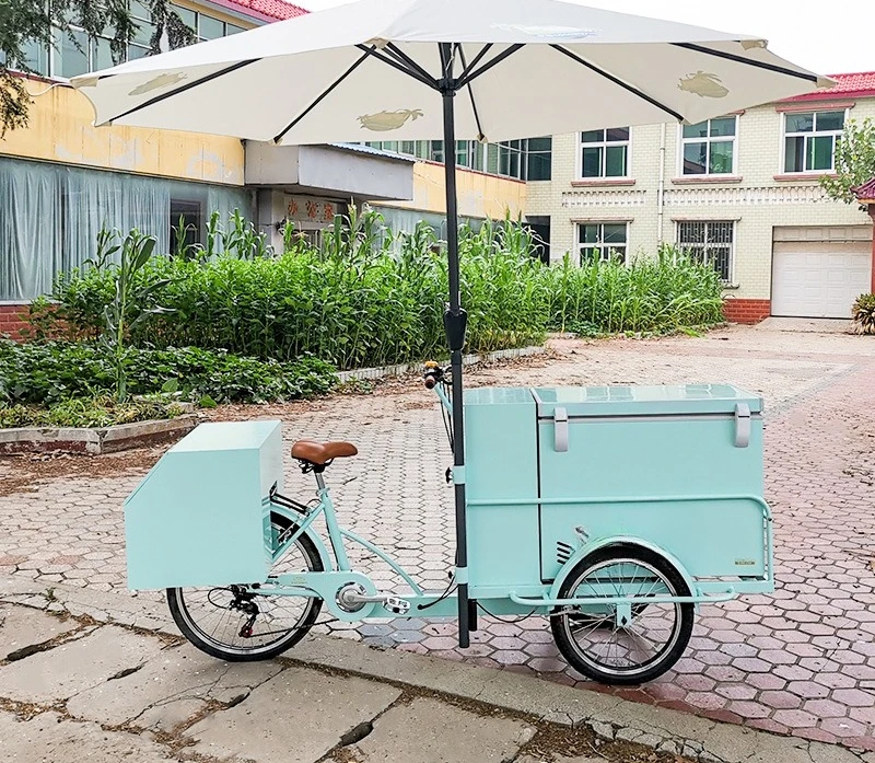 

Human-powered pedal tricycle, refrigerator truck, street view, street stall, ice cream, cold drinks, takeaway truck