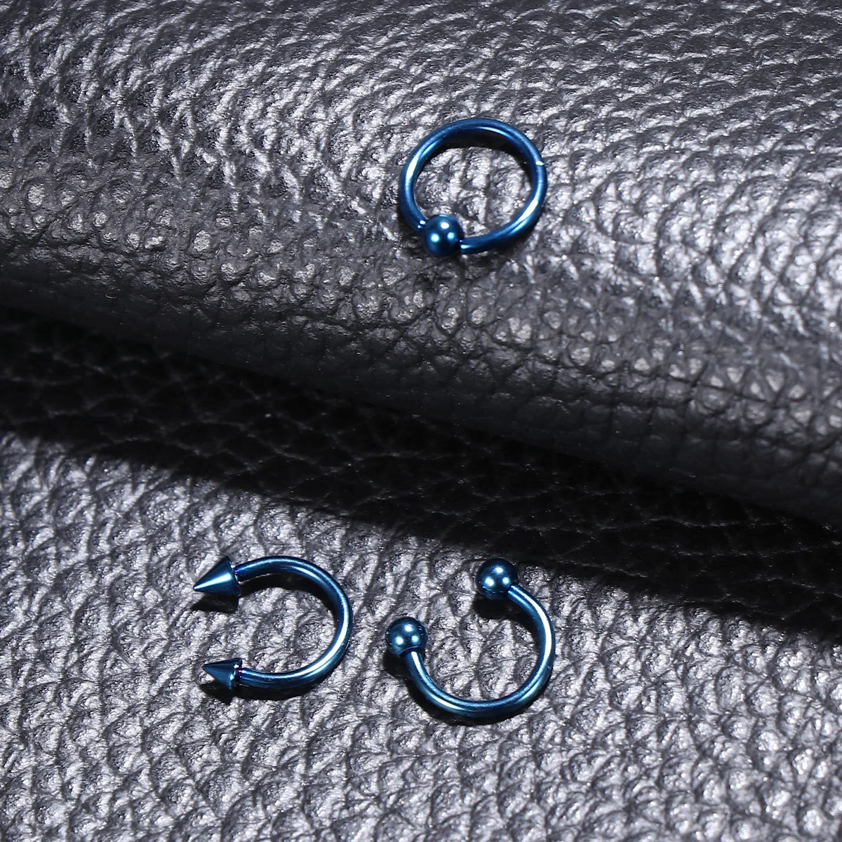 

8pcs Stainless Steel Curved Eyebrow Nose Lip Earrings Piercings Punk Unisex Body Piercing Jewelry (Blue)