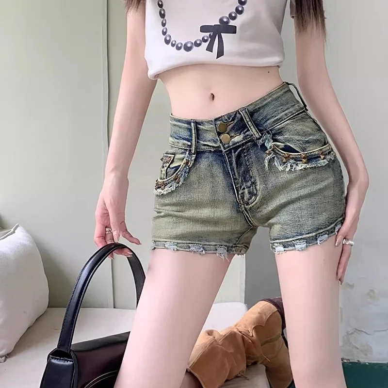 

Spicy Girl Style Low Waisted Ripped Jeans Hot Pants Summer Women Sexy Mini Short Jeans Ladies Chic Korean Slim Fit Denim Shorts