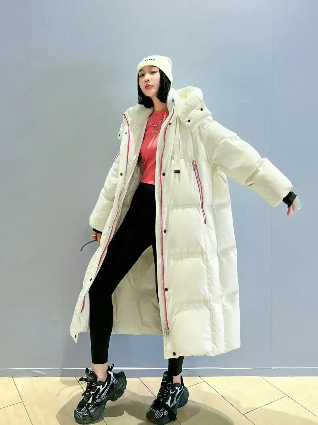 Piumino lungo da donna invernale nuovo piumino d'anatra bianco addensato caldo piumino con cappuccio moda colletto alla coreana allentato abbigliamento da pane