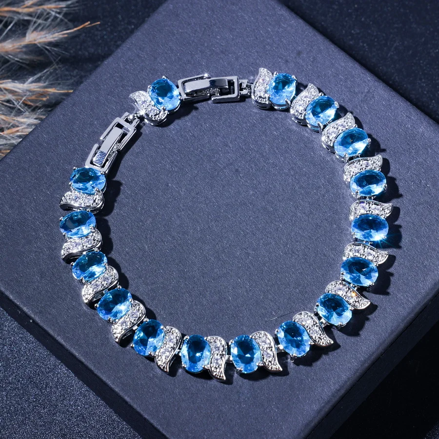 4PCS- Elaegant Sky Blue Zircon Fashion Jewelry Set - Includes Bracelet, Earrings, Necklace, And Rings For Everyday Wear