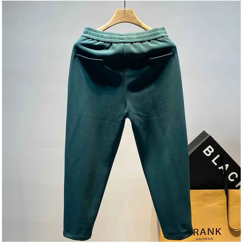 American Retro Spring Autumn Men's 2024 New Spliced Elasticized Pocket Fashion Solid Color Loose Minimalist Casual Harem Pants