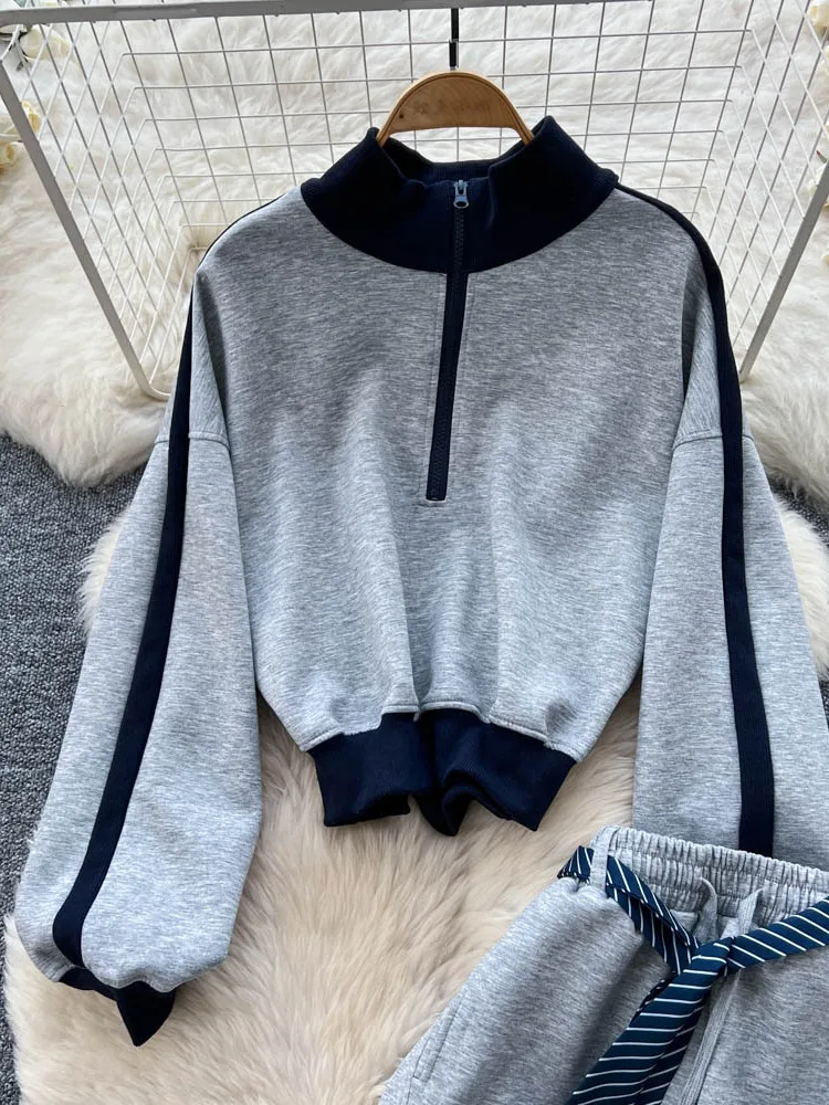 ชุดเซ็ตเสื้อฮู้ดแขนยาวสไตล์เรโทรอเมริกันสีตัดกัน กางเกงขายาวเอวสูงทรงขากว้างสำหรับผู้หญิง ชุดลำลองแฟชั่น