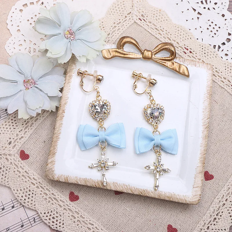 Pendientes de lazo azul claro y suave, Clips para sin piercing en la oreja, pendientes de amor cruzados con diamantes de imitación para mujer, pendientes con aguja de plata 925