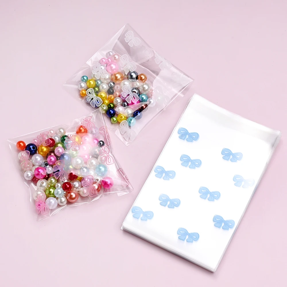 40 Stück Cartoon-Schleifen-Transparente Ziplock-Beutel, OPP-Selbstverschlussbeutel aus Kunststoff für Schmuck, Perlen, Bastelarbeiten und Kleinteile-Verpackung – Detail 5