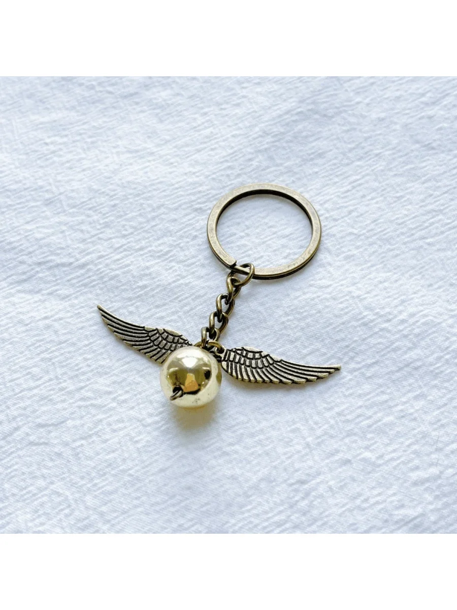 Llavero Metálico con Forma de Ala de Snitch Dorada para Bolsos y Coches, Regalo Coleccionable