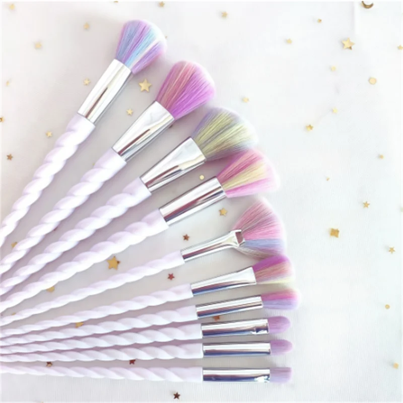 Colorful gradient color spiral handle brush set for applying makeup including a beauty brush for applying blush and a f