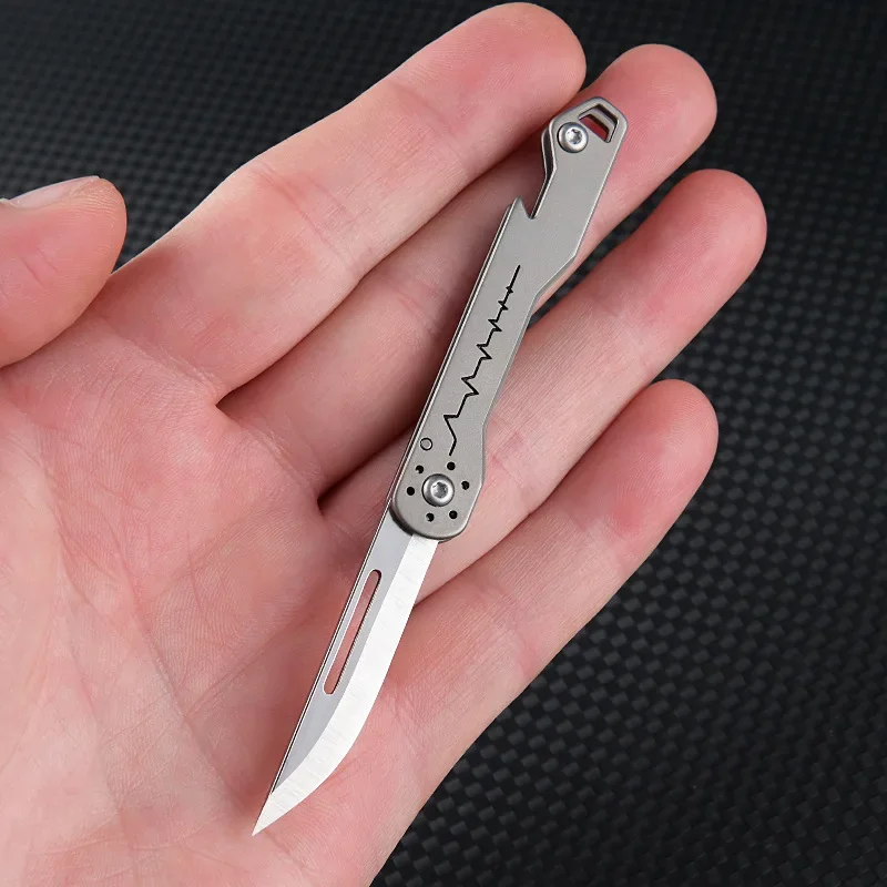 NEW Titanium Heart Sharp Titanium Alloy Mini Folding Knife with Bottle Opener, Portable Keychain, Unpacking, and Delivery Knife