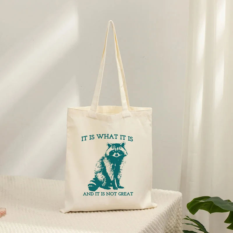 

Сумка-тоут из холщовой ткани Teal Raccoon, многоразовая сумка через плечо с саркастическим принтом «It Is Not Great», модная сумка для подарков любителям мемов
