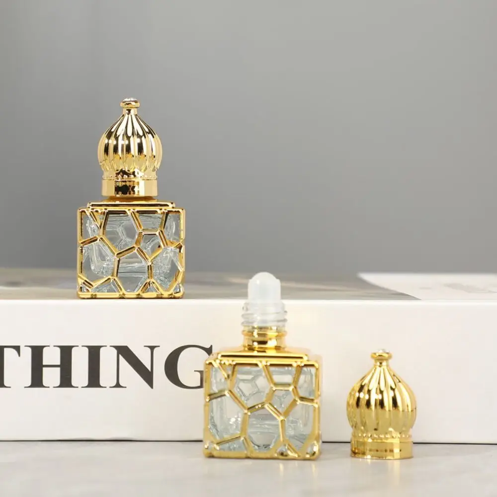 

Water Cube Filling Perfume Bottle Matte Crown Shape Liquid Sample Portable Empty Bottle Luxury Gold Glass Oil Roller Bottle