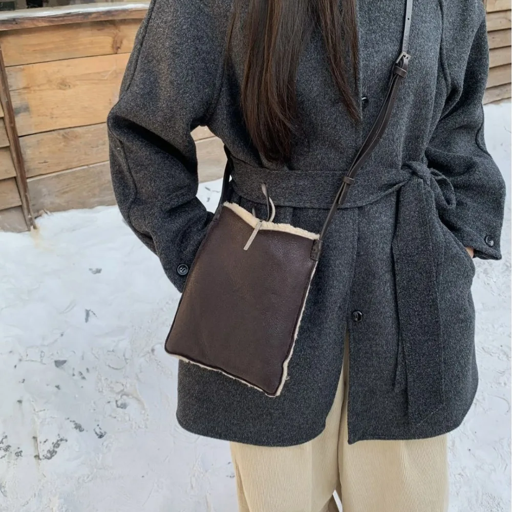 

The First Layer of Cowhide Fur Integrated Wool Bucket Bag Mobile Phone Bag Shoulder Crossbody Small Square Bag Women's 2025 New