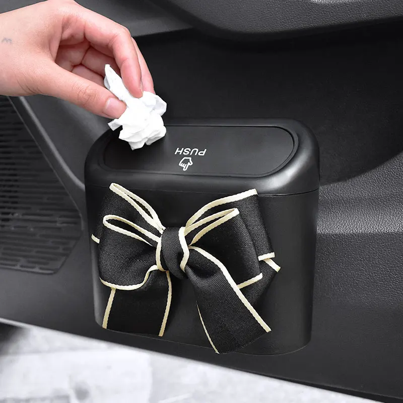 

Cute Bowknot Car Trash Bin Hanging Vehicle Garbage Dust Case Storage Box Pressing Type Trash Can Auto Car Interior Accessories