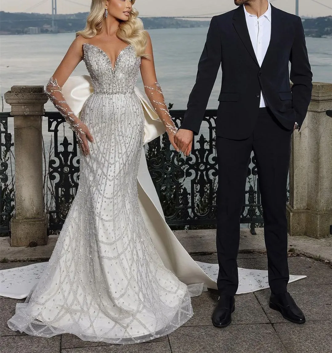 

Sparkly Mermaid Wedding Dresses Long Sleeves V Neck Sequins 3D Lace Appliques Bow Knot Diamonds Bridal Gowns Vestina De Novia