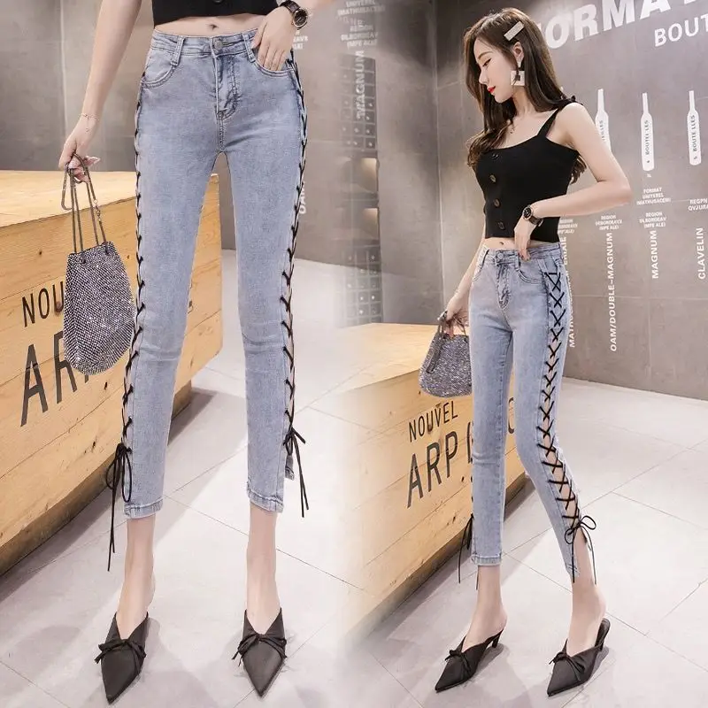 

2023 Summer Women New Fried Street Elastic Thin Dhort Feet Pencil Pants Female Online Celebrity Strap Bandage High Waist Jeans