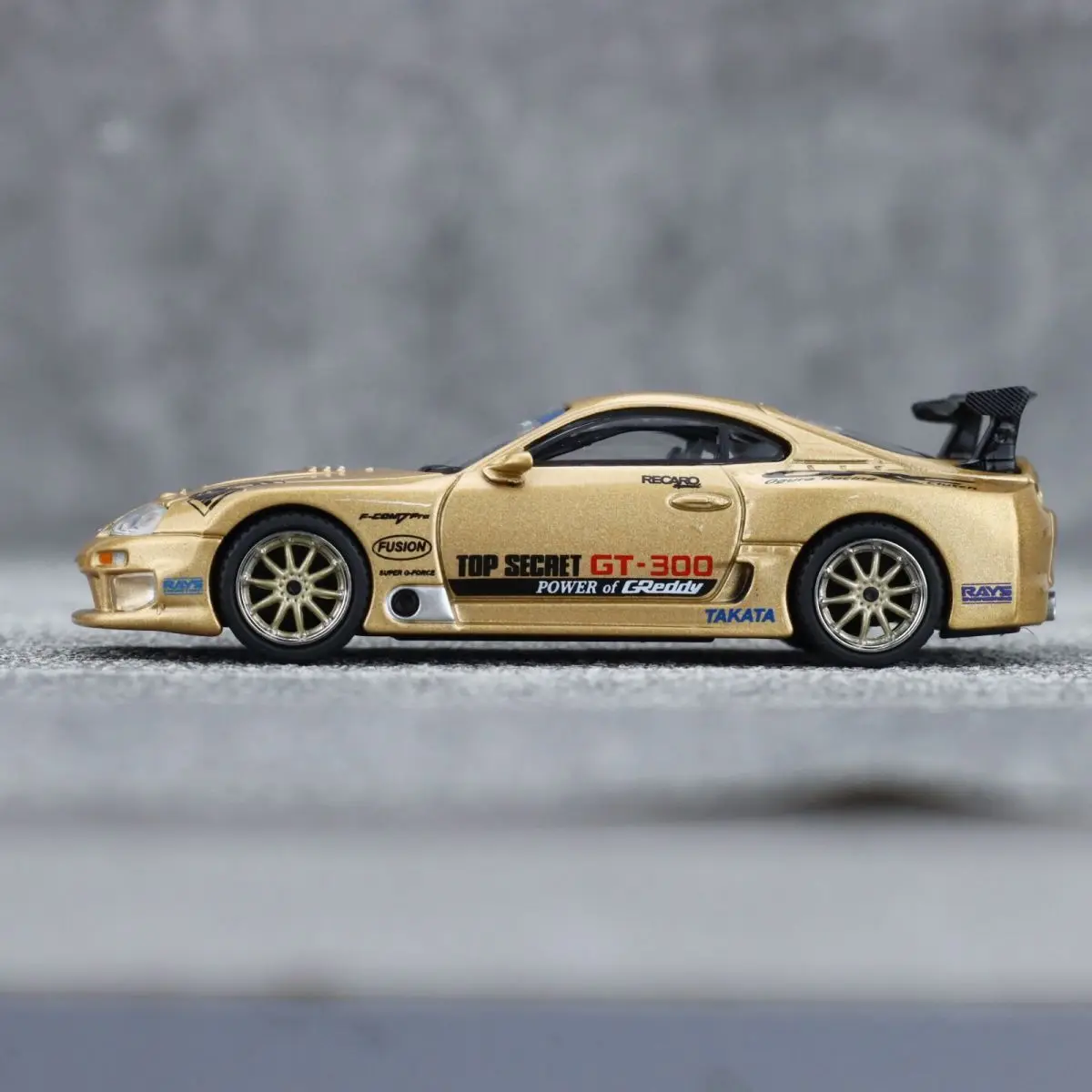 

MINIGT 1:64 Toyota Supra A80 Top Secret GT300 Gold, Alloy Model