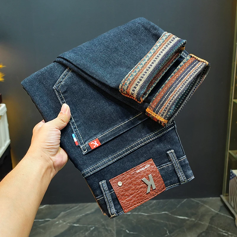 

Light luxury high-end jeans men's autumn 2025 new men's clothing elastic slim fit small feet embroidered print design long pants