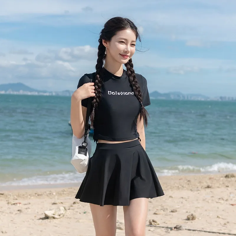 Women's 2-Piece Crop Top Rash Guard Swimsuit with Skirted Bottom, Short Sleeve Swimwear Set for Beach Vacation and Swimming Pool
