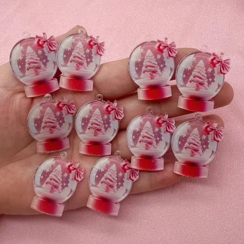 10 Uds. Populares pendientes de acrílico europeos y americanos con forma de bola de nieve y árbol de Navidad con lazo rosa, accesorios de moda navideños