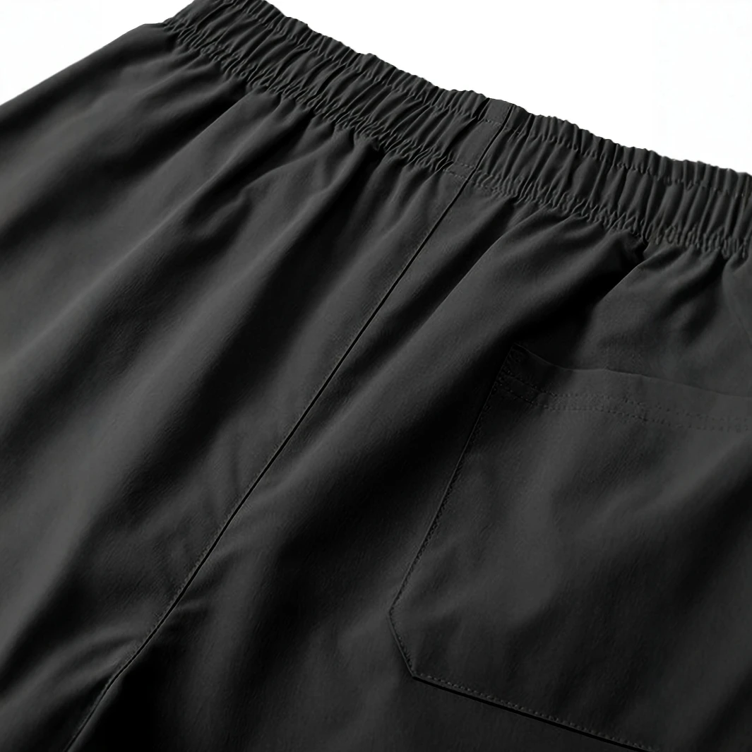 Lässige Sommershorts für Herren mit Taschen – Schwarz, elastischer Bund, Kordelzug, Polyester, zweilagiges Design, leicht und atmungsaktiv