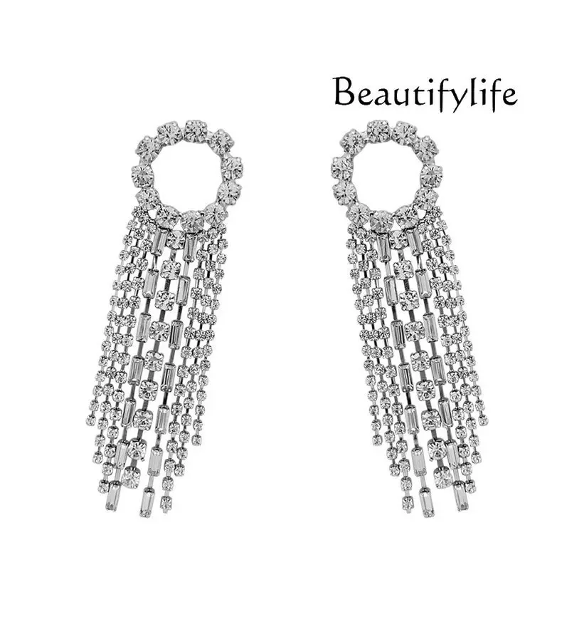 

Light luxury exquisite rhinestone fringed stud earrings long temperament European and American personalized designer daily