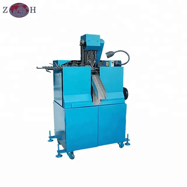 Máquina de gancho y ojo para cinta de ropa interior