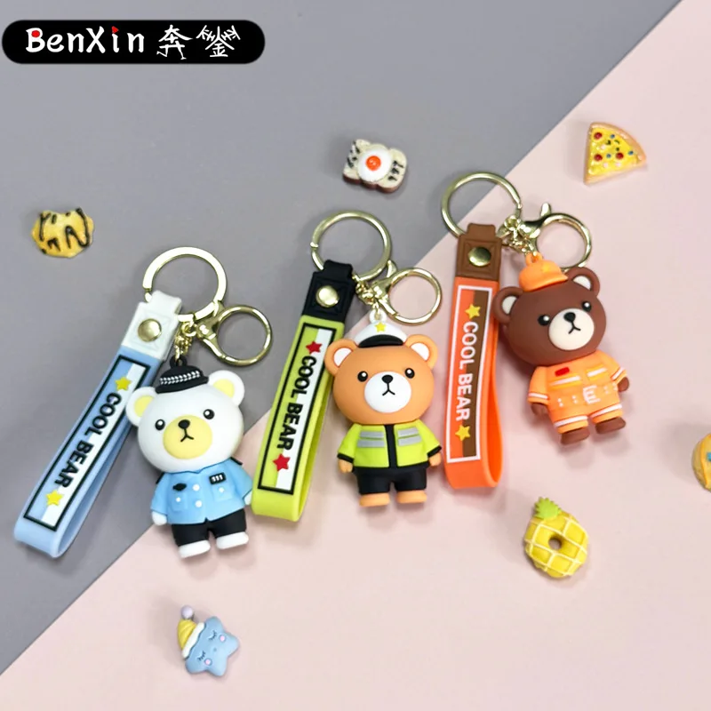 Minso Cartoon-Polizeibär-Schlüsselanhänger, Feuerwehrmann-Bärentaschen, Autoanhänger, Krallenmaschinen, kleine Geschenke für den Straßenstand