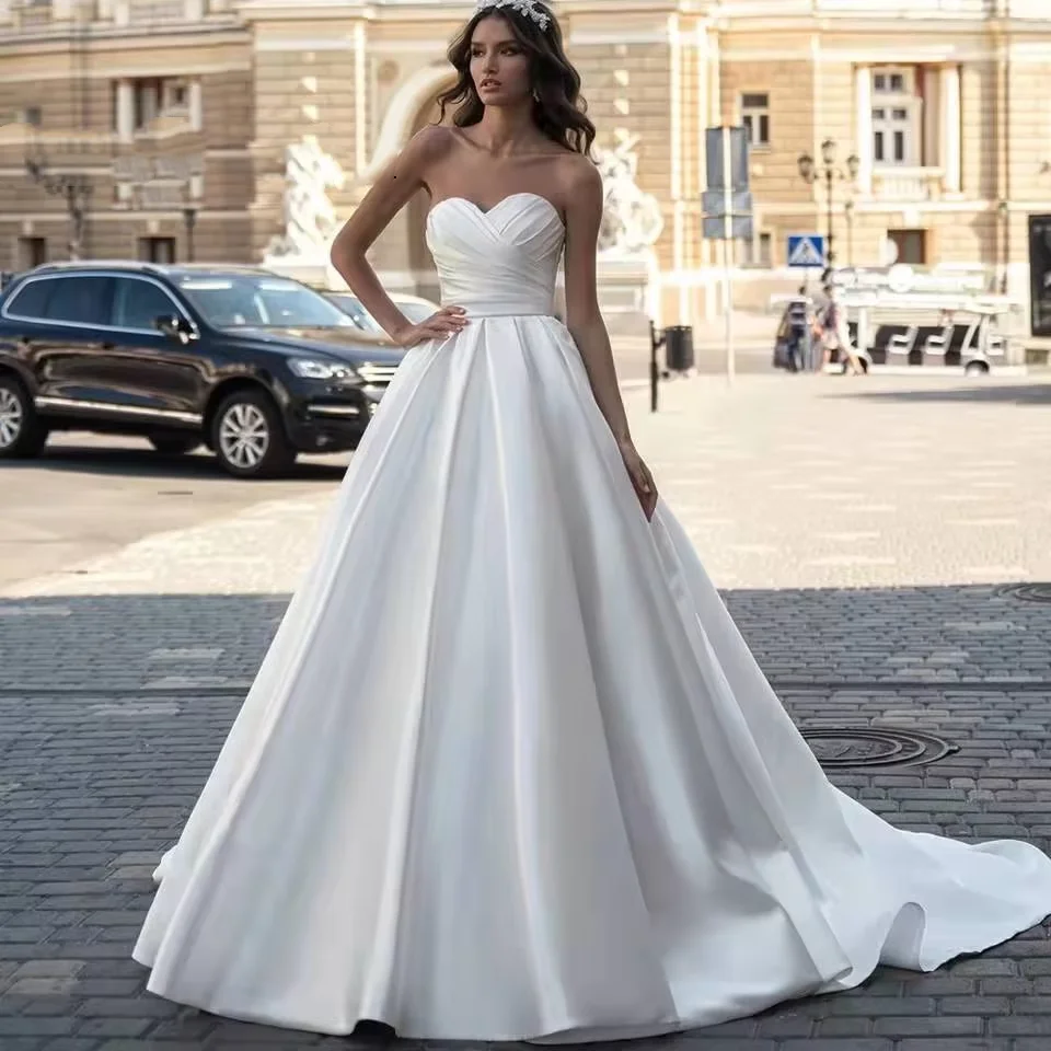 Flavinke Elegant A Line Strapless Wedding Ball Gown Sleeveless Backless Satin Princess Wedding Dress For Women Vestidos De Noiva