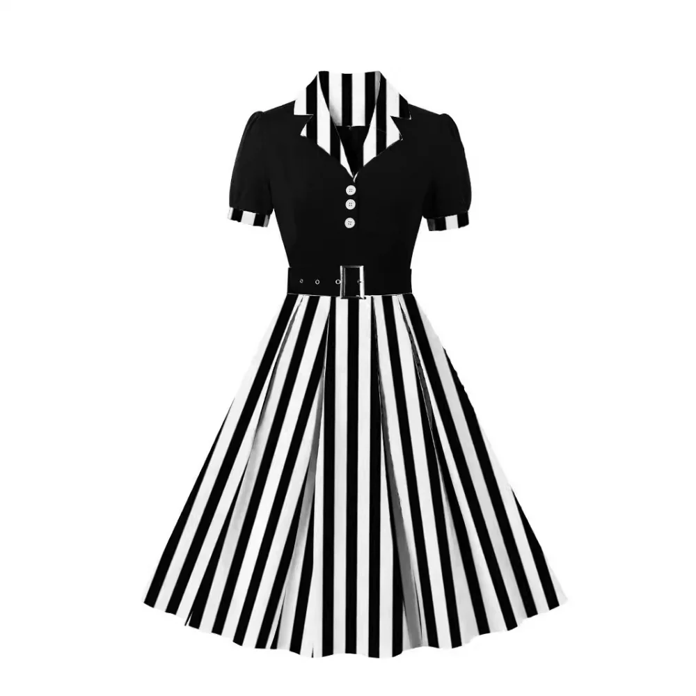 فستان نسائي ريترو 1950s بأكمام قصيرة وطية صدر مدببة وشريط منقط فستان محكم من عند الصدر ويتدلى بشكل واسع مع حزام فستان كوكتيل
