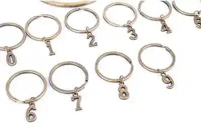 Retro Super Chaveiros D.8,5cm com 10 números anéis D.3cm NOVO