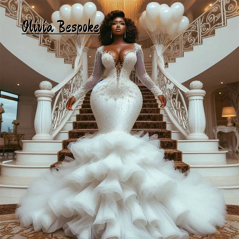 

Exceptional Crystal Beading Wedding Dresses For Brides 2025 Aso Ebi Style Ruffles Train Long Sleeves robe de mariée Customized