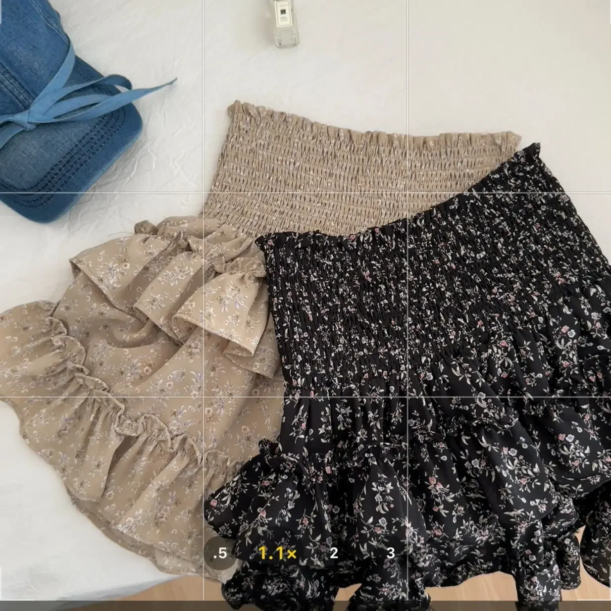 Kwiatowa spódnica do połowy długości 2025 nowa elastyczna wiosenna i letnia wysoka talia pokaż przerzedzająca brzuch mała czarna krótka spódniczka