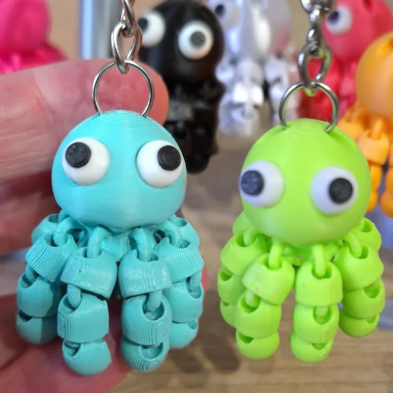 Llavero de juguete con estampado 3D Kawaii, colgante de pulpo, calamar con articulaciones móviles, llavero con pantalla colorida creativa 2025