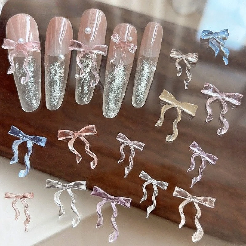 

Ice Transparent Dreamy Light Colored Bow Tie Colorful Resin Bowknot Ribbon Nail Art Decorations Manicure Accessories Wholesale