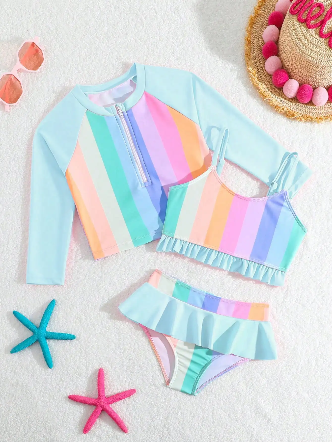 

Комплект купальников-танкини пастельных тонов в полоску с рюшами и топом с длинными рукавами