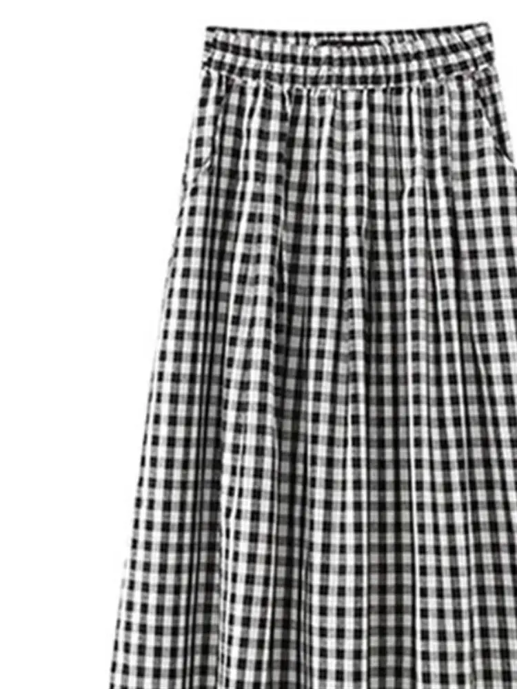 تنورة صيفية رفيعة منقوشة باللون الأسود للنساء عالية الخصر للتخسيس مقاس صغير غير رسمي على شكل حرف a تنورة طويلة نصف الجسم نمط ...