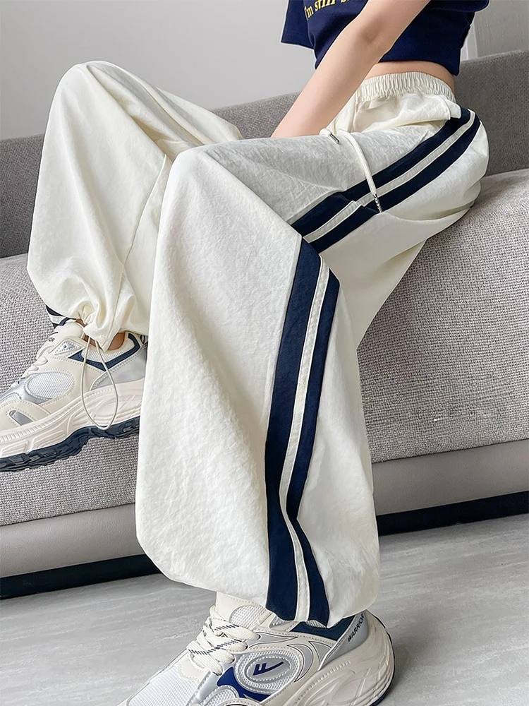 

Женские летние повседневные брюки из ледяного шелка с широкими штанинами, с боковыми полосками, быстросохнущие, спортивные, прямого кроя, длинные