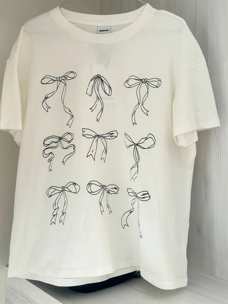 T-Shirts mit Schleifenband-Aufdruck für Damen, kokettefarben, ästhetisch, trendiges Y2k-T-Shirt, niedliche, lockere, kurzärmelige Grafik-T-Shirts aus Baumwolle