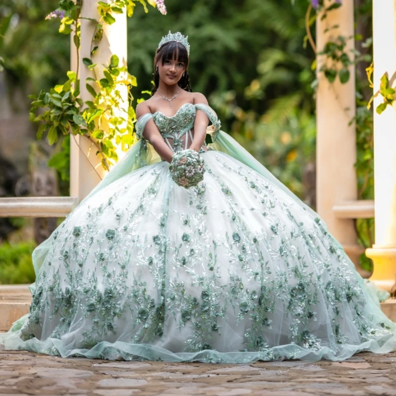 

Light Green Shiny Ball Gown Quinceanera Dresses 2026 Applique Flower Beading Crystal Tull With Cape Off Shoulder Sweet 16 Dress