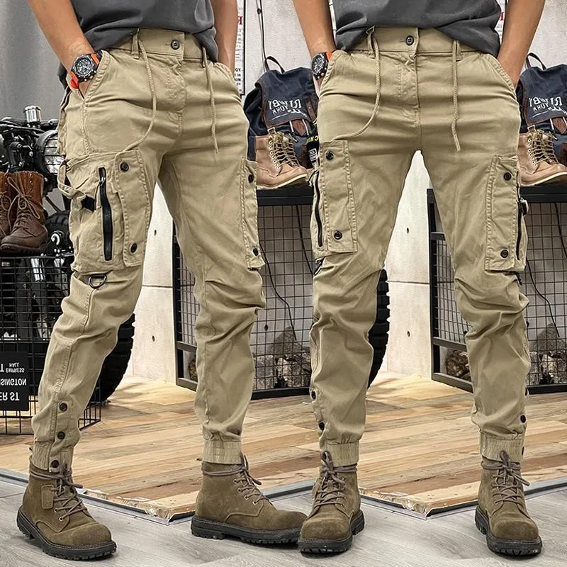 Pantalones de trabajo de Hip-hop Retro para hombre, pantalones de cintura elástica con cremallera, Bolsillo grande Simple, con cordones, estilo